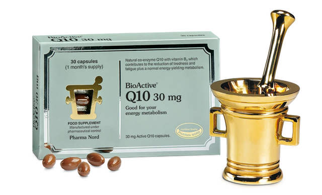 BioActive Q10 30 mg supplement packaging with capsules and a gold mortar and pestle.