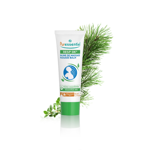 Puressentiel Resp OK Massage Balm tube featuring a chest and throat illustration, set against a dark checkered background with pine and herb branches.