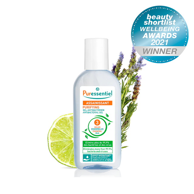 Puressentiel purifying antibacterial hand gel pump with a lime slice and lavender sprigs.