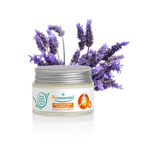 Puressentiel muscles and joints soothing balm jar with sprigs of lavender.