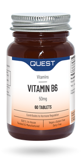 Amber glass bottle of Quest Vitamin B6 50mg tablets with silver cap.
