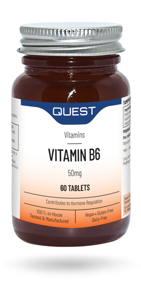 Amber glass bottle of Quest Vitamin B6 50mg tablets with silver cap.