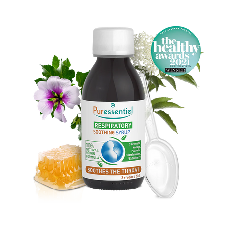 Puressentiel respiratory soothing syrup bottle with honeycomb, a purple flower, and a plastic measuring spoon.