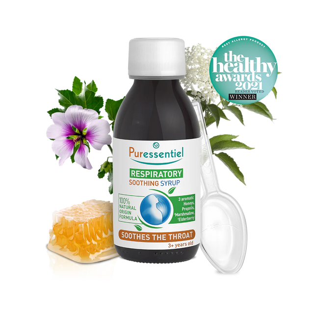 Puressentiel respiratory soothing syrup bottle with honeycomb, a purple flower, and a plastic measuring spoon.