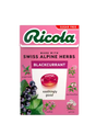 Pink sugar-free Ricola Blackcurrant herb drops box with botanical illustrations.
