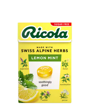 Yellow sugar-free Ricola Lemon Mint herb drops box with botanical illustrations.