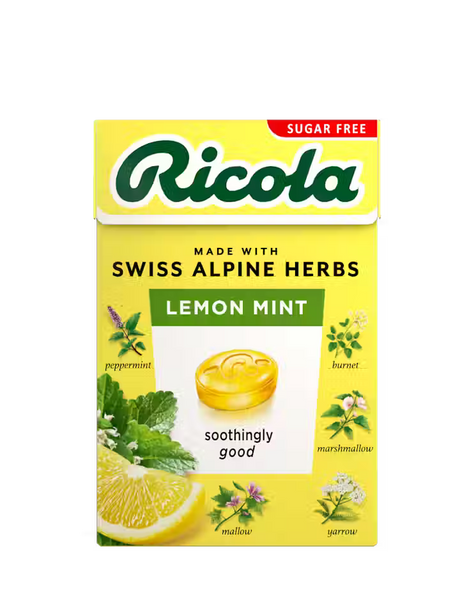 Yellow sugar-free Ricola Lemon Mint herb drops box with botanical illustrations.