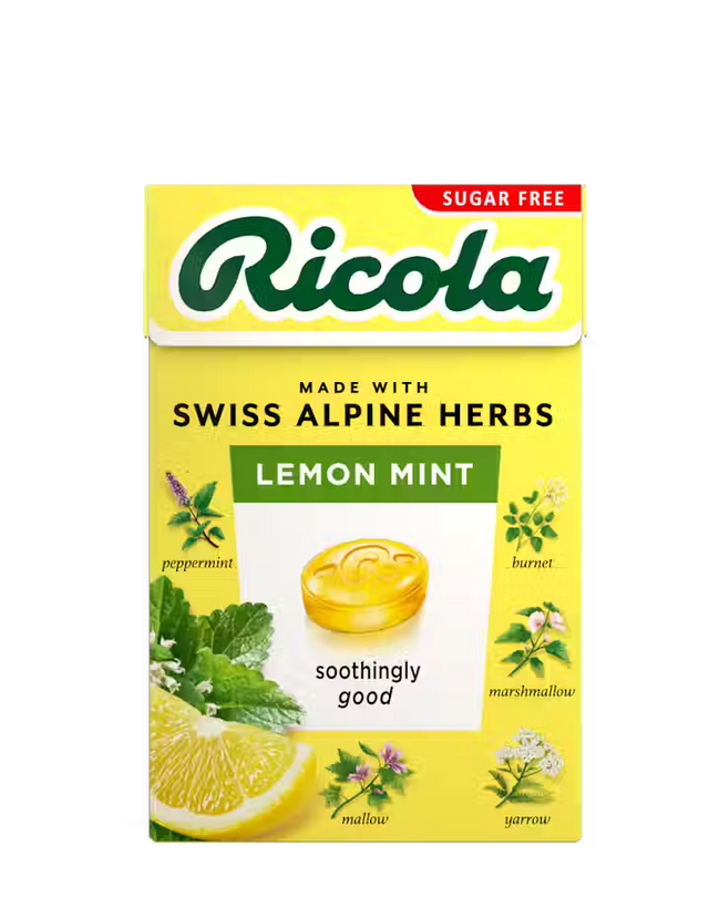 Yellow sugar-free Ricola Lemon Mint herb drops box with botanical illustrations.