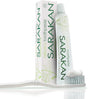 "Sarakan Nature's Toothpaste, featuring the toothpaste tube, its outer packaging box, and a toothbrush with a dollop of paste; formulated with natural extract of Salvadora persica to clean, freshen, and help remove stains."