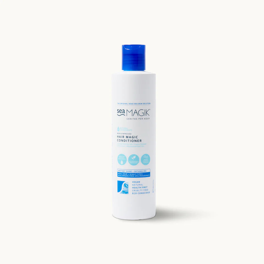 Tall white bottle of Sea Magik Hair Magic Conditioner with a blue cap and label.
