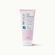 Light pink tube of Sea Magik Pink Salt Shampoo with a white label and white cap.