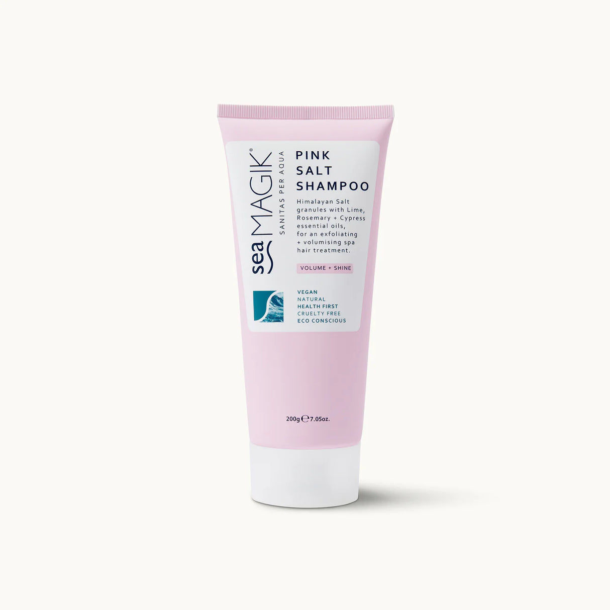 Light pink tube of Sea Magik Pink Salt Shampoo with a white label and white cap.