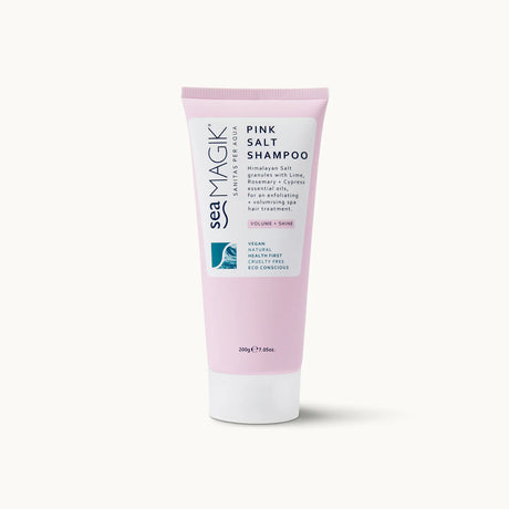 Light pink tube of Sea Magik Pink Salt Shampoo with a white label and white cap.