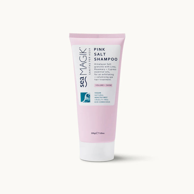 Light pink tube of Sea Magik Pink Salt Shampoo with a white label and white cap.