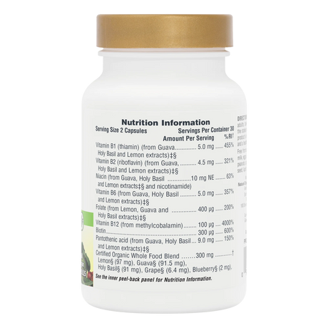 Side-profile shot of a white NaturesPlus supplement bottle with a gold cap, focusing on the "Nutrition Information" panel and certified organic whole food blend.