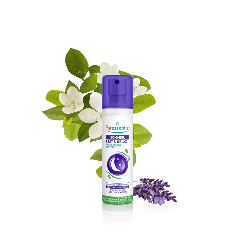 A 75ml (2.5 fl. oz.) bottle of Puressentiel "Sommeil" Rest & Relax Air Spray (Spray Aérien). The white bottle features a purple spray cap and a central illustration of a crescent moon and stars inside a purple circle.