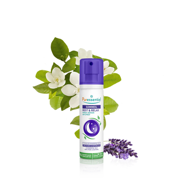 A 75ml (2.5 fl. oz.) bottle of Puressentiel "Sommeil" Rest & Relax Air Spray (Spray Aérien). The white bottle features a purple spray cap and a central illustration of a crescent moon and stars inside a purple circle.
