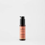 Sukin Brightening Illuminating Moisturiser in a dark amber pump bottle.