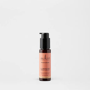 Sukin Brightening Illuminating Moisturiser in a dark amber pump bottle.