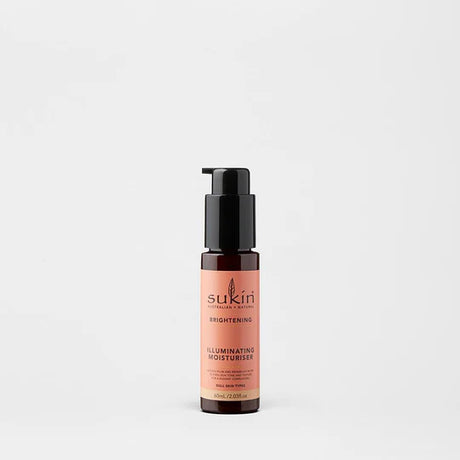 Sukin Brightening Illuminating Moisturiser in a dark amber pump bottle.