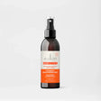 Sukin Glow Active-C Vitamin C Brightening Mist in a dark spray bottle.