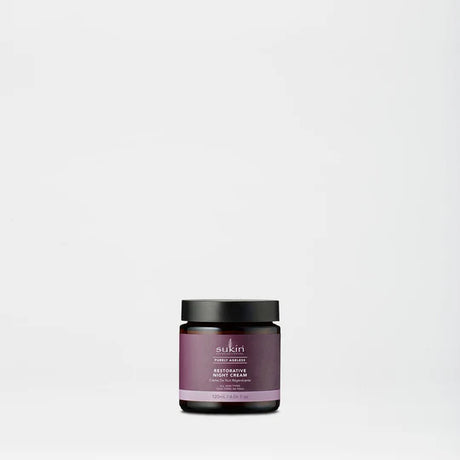 Sukin Purely Ageless Restorative Night Cream in a purple-labeled amber jar.