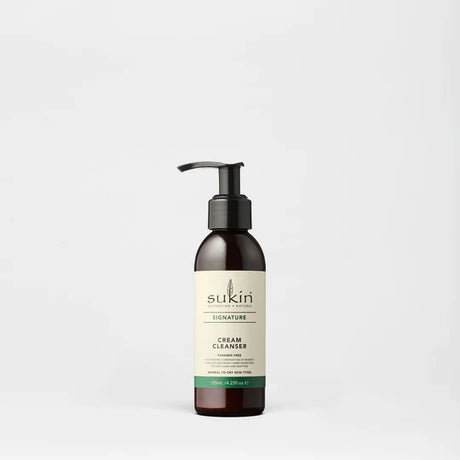 Sukin Signature Cream Cleanser in a dark pump bottle, paraben free.