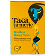 Yellow box of Taka Turmeric Rooibos Honeybush tea featuring a large stylized "T" and swirling patterns.