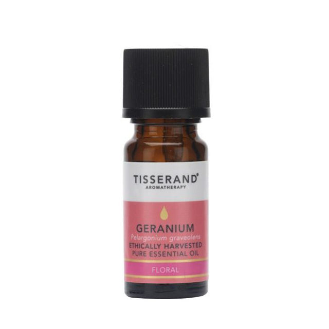 A 9ml amber glass bottle of Tisserand Aromatherapy Geranium Pure Essential Oil with a black cap and pink label against a white background.