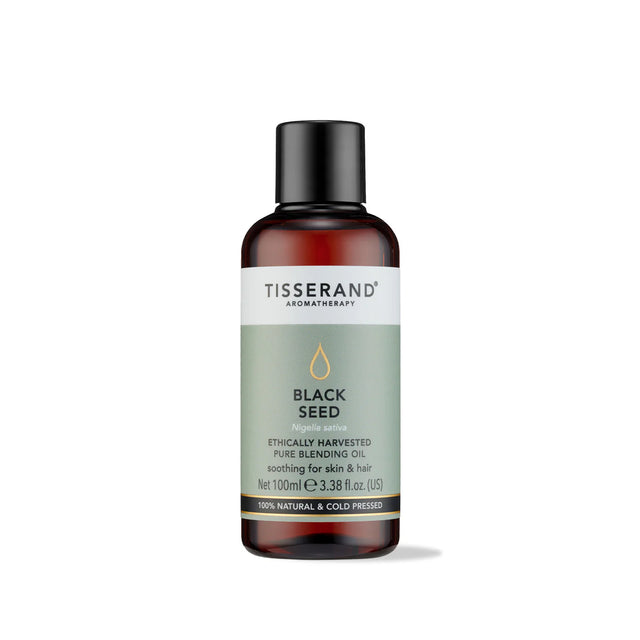 100ml amber glass bottle of Tisserand Black Seed oil with a sage green and white label and a black screw cap.