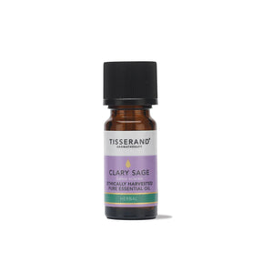 A small amber glass bottle of Tisserand Clary Sage ethically harvested pure essential oil with a purple and white label and a black cap.
