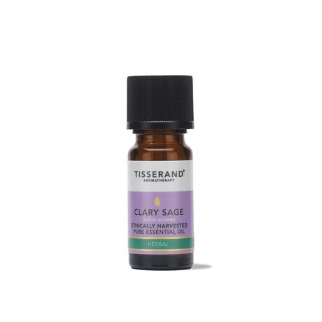 A small amber glass bottle of Tisserand Clary Sage ethically harvested pure essential oil with a purple and white label and a black cap.