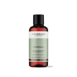 100ml amber glass bottle of Tisserand Grapeseed oil with a sage green and white label and a black screw cap.