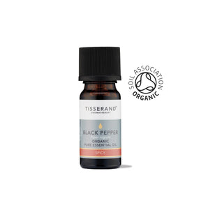 A small amber glass bottle of Tisserand Black Pepper organic pure essential oil with a grey, white, and red label and a black cap.