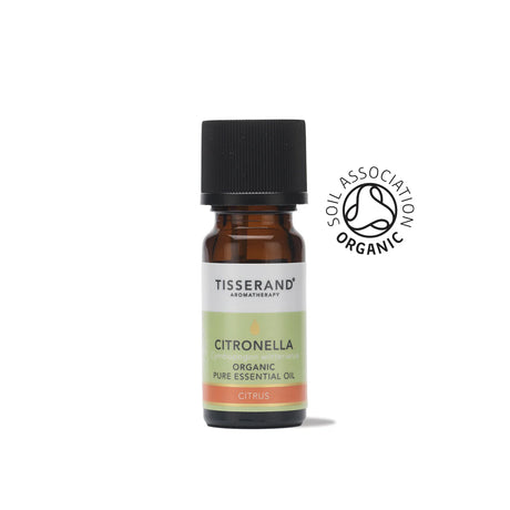 A small amber glass bottle of Tisserand Citronella organic pure essential oil with a light green and white label and a black cap.