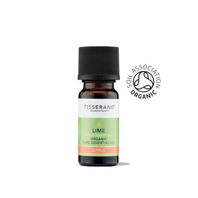 A small amber glass bottle of Tisserand Lime organic pure essential oil with a bright green and white label and a black cap.