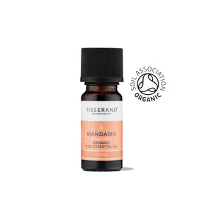 A small amber glass bottle of Tisserand Mandarin organic pure essential oil with a peach and white label and a black cap.