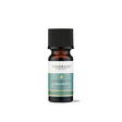 A small amber glass bottle of Tisserand Siberian Fir pure essential oil with a teal and white label and a black cap.