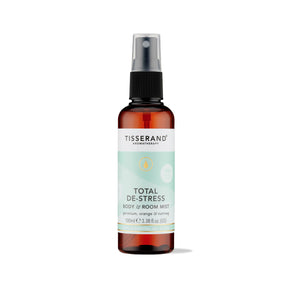 100ml amber spray bottle of Tisserand Total De-Stress mist with a light teal and white label.