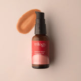 A 30ml amber glass bottle of Trilogy Instant Glow Rosehip Oil with a black pump dispenser and a vibrant red label.