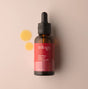 A 45ml amber glass bottle of Trilogy Certified Organic Rosehip Oil with a black dropper cap and a signature red label.