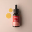 A 30ml amber glass bottle of Trilogy Rosehip Oil Antioxidant+ featuring a black dropper cap and a bold red label. 