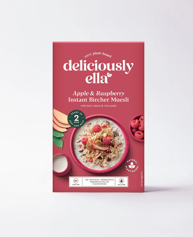 Deliciously Ella Apple & Raspberry Instant Bircher Muesli, a 100% plant-based, gluten-free, and high-fiber cereal mix with juicy raisins and chia seeds.