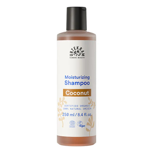 250ml bottle of Urtekram Coconut Shampoo with a white label, brown "Coconut" banner, and organic and vegan logos.