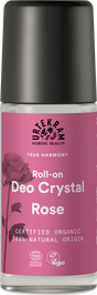 A glass roll-on deodorant bottle with a pink label featuring a rose illustration, Urtekram branding, and organic and vegan certifications.