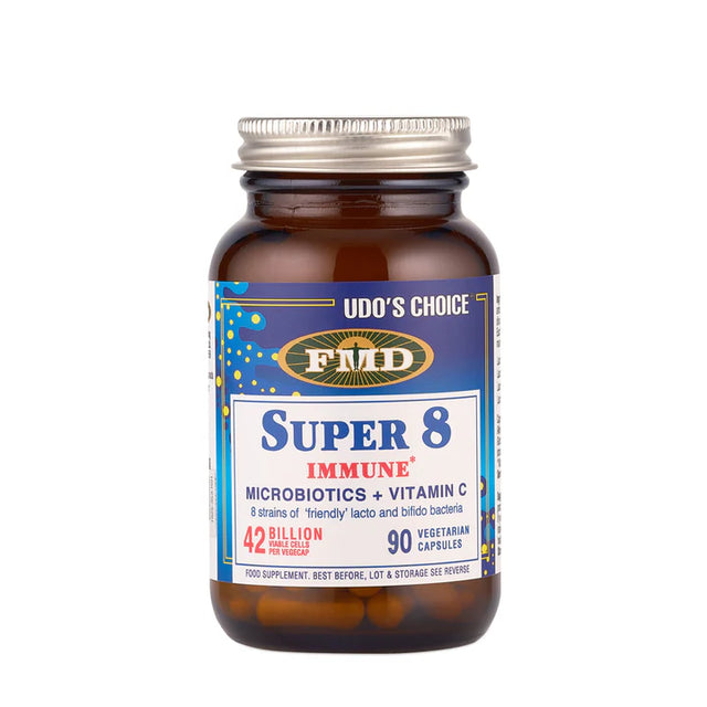 A dark amber glass bottle of Udo's Choice Super 8 Immune supplement with a silver screw cap and a blue and white label detailing 42 billion viable cells and 8 strains of bacteria.