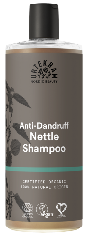 Grey bottle of Urtekram Anti-Dandruff Nettle Shampoo featuring a black cap and certified organic natural labels.