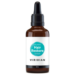 A 50ml amber glass dropper bottle of Viridian Organic Hair Restore Serum with a white label and a turquoise watercolor-style circle, isolated on a white background.
