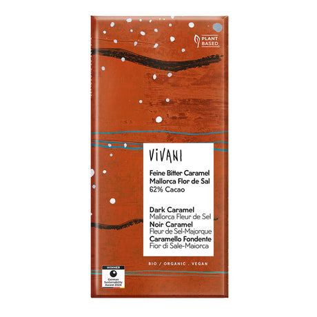 Vivani Dark Caramel Mallorca Fleur de Sel chocolate bar featuring an artistic reddish-brown painted wrapper with black text.