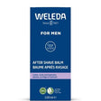 A blue 100ml box of Weleda After Shave Balm for men featuring a feather icon, a purple stripe, and organic certification logos.